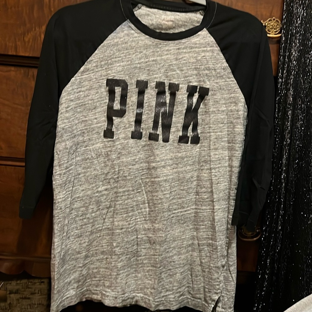 Pink color block gray and black shirt.